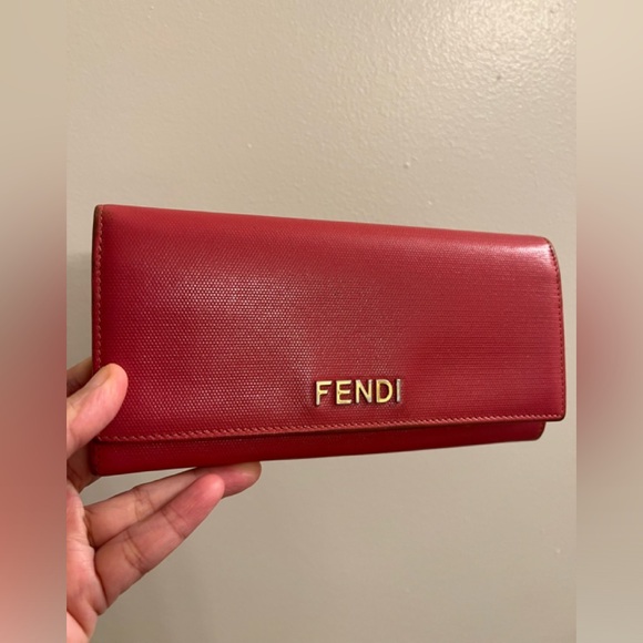 Fendi Handbags - FENDI Bi-fold long wallet, dark pink.  Small rubbing on edges